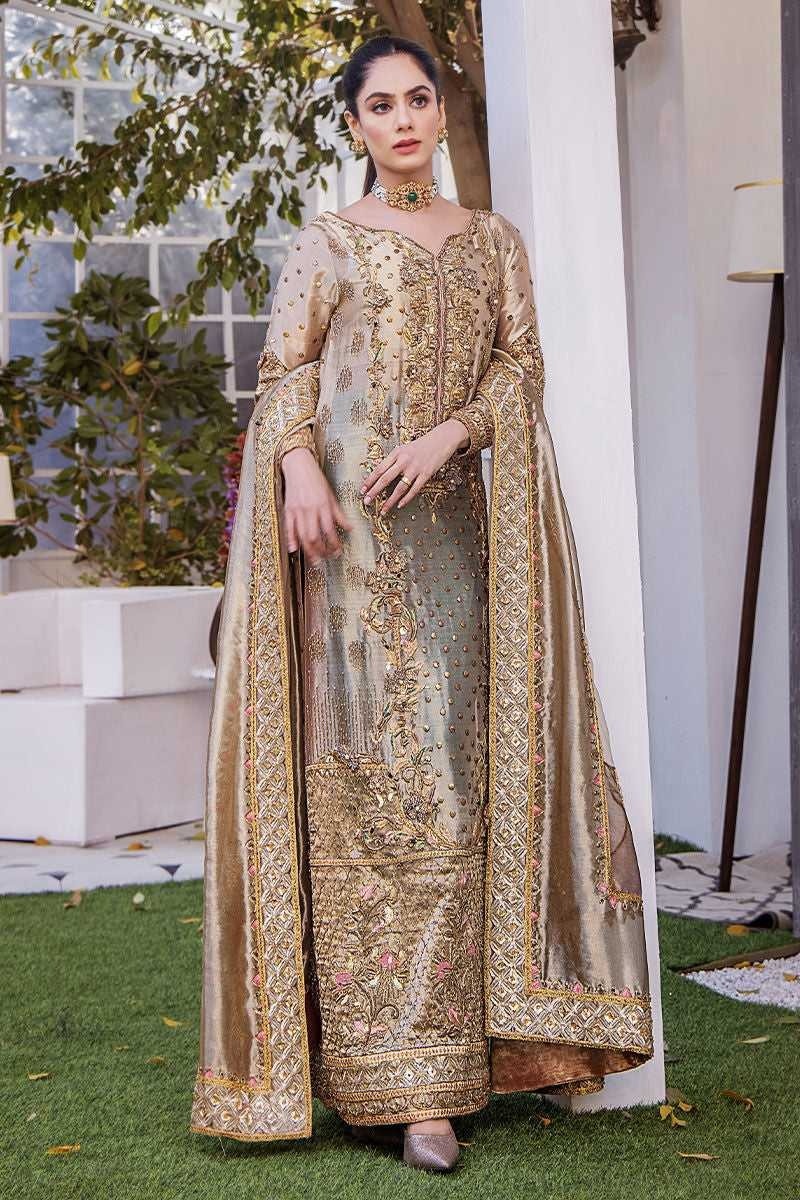 Noor- e- Samar pakistani fashion outfit in gold, green tones.